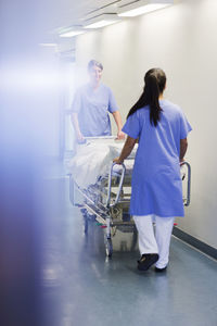 Nurses walking through corridor