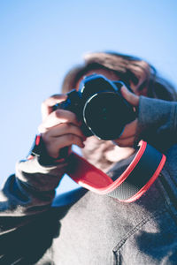 Midsection of person photographing