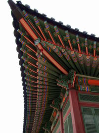 Low angle view of ornate building against clear sky