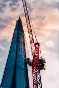 Low angle view of crane at construction site