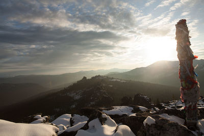 Scenic view of mountains against sky during sunset