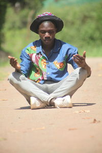 Man sitting in hat