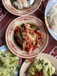 High angle view of chopped vegetables in bowl on table