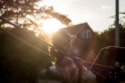 Teenage girl on swing