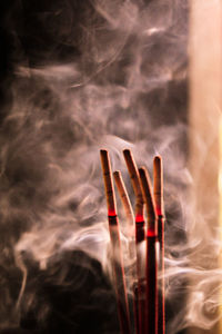 Close-up of smoke emitting from chimney