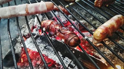 High angle view of meat on barbecue grill