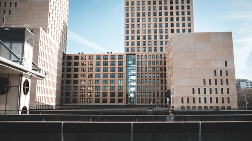 Low angle view of skyscrapers against sky