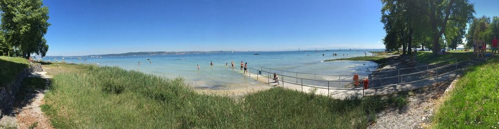 Panoramic view of sea against clear sky