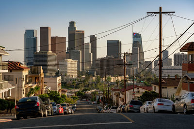 City street and modern buildings against sky