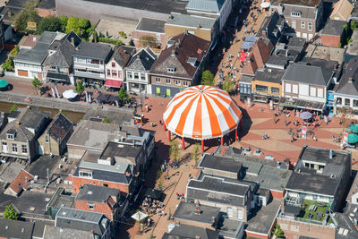 High angle view of street amidst buildings in city