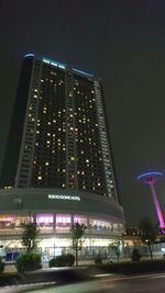 Low angle view of modern building at night