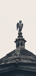 Low angle view of statue against clear sky