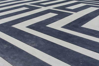 Full frame shot of zebra crossing on road