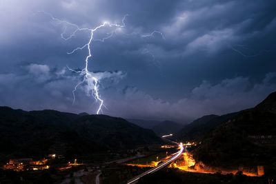 Dramatic sky over illuminated city