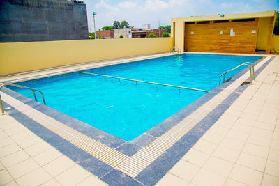 View of swimming pool against building