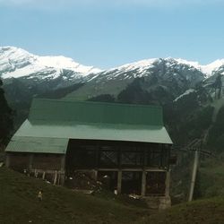 Scenic view of snow covered mountains