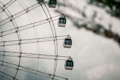 Low angle view of cables against sky