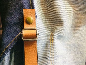 High angle view of leather through wooden floor