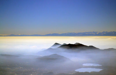 Scenic view of mountains against sky during sunset