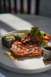 Close-up of food in plate on table