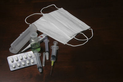 High angle view of bottles on table