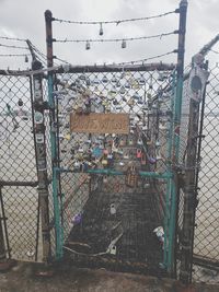 Chainlink fence against sky