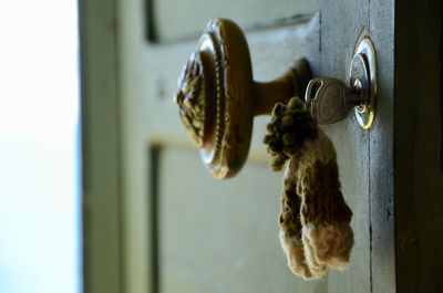 Close-up of key in door