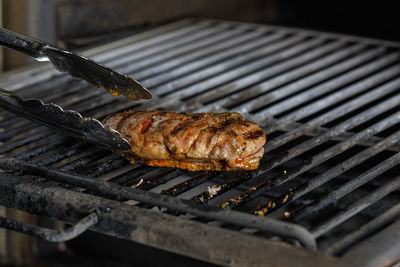 Close-up of meat on barbecue grill