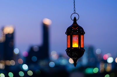 Hanging lantern with night sky for the muslim feast of the holy month of ramadan kareem.