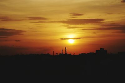 Scenic view of silhouette orange sky during sunset