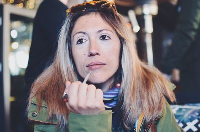 Close-up portrait of young woman