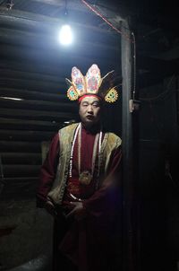 Man standing in traditional clothing