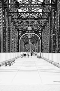 View of people walking on bridge