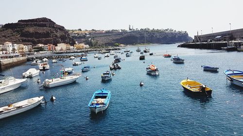 High angle view of boats moored in harbor