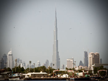 Panoramic view of buildings against clear sky