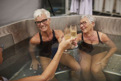 Senior women relaxing in hot tub