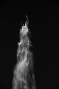 Close-up of smoke against black background