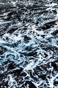 Full frame shot of water flowing in sea