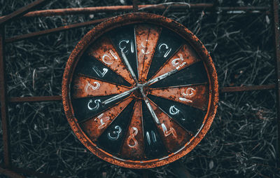 High angle view of old rusty play wheel