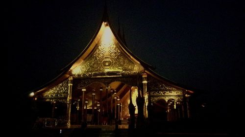 Low angle view of illuminated built structure