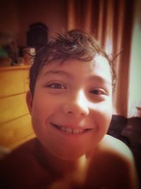 Close-up portrait of smiling boy
