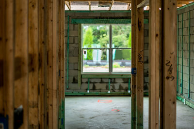 Close-up of open door of house