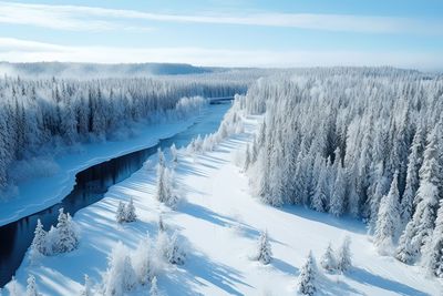 Scenic view of snow covered landscape against sky