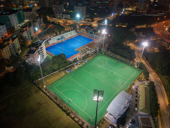 High angle view of illuminated city buildings