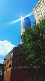 Low angle view of building against blue sky