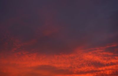 Low angle view of dramatic sky during sunset