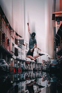 Man jumping in city