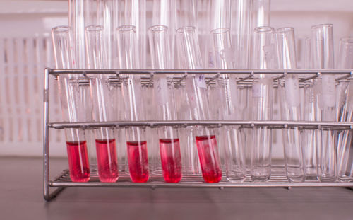 Red chemical in container at laboratory