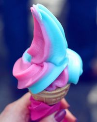 Close-up of hand holding ice cream