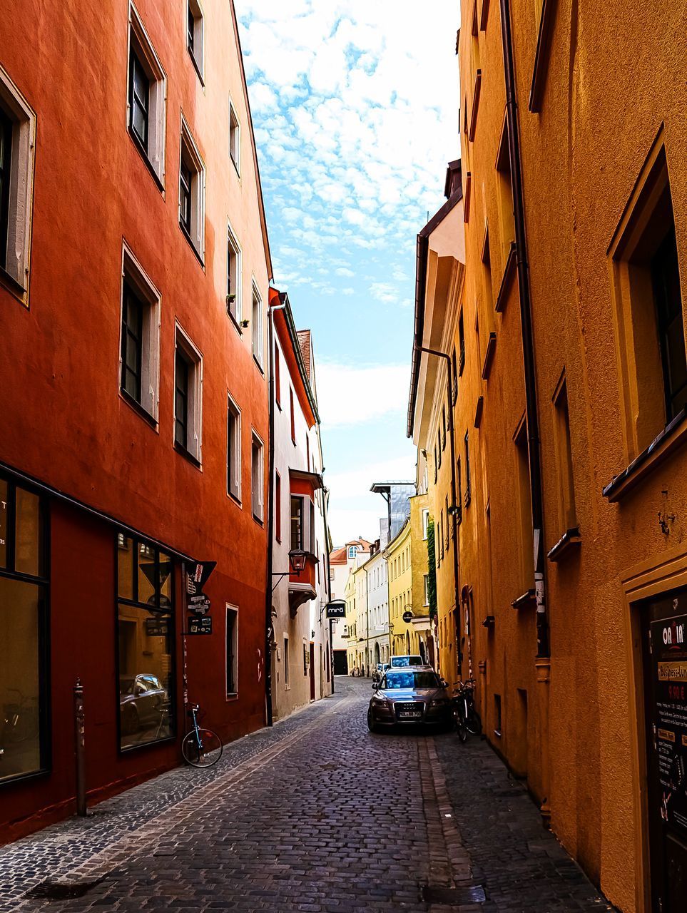 STREET AMIDST RESIDENTIAL BUILDINGS